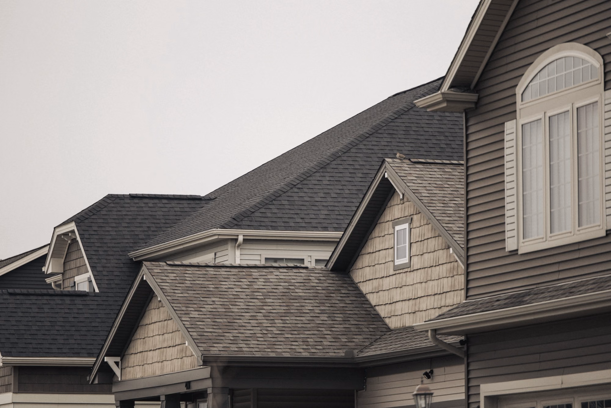 Detailed rooflines and exterior materials on a residential property